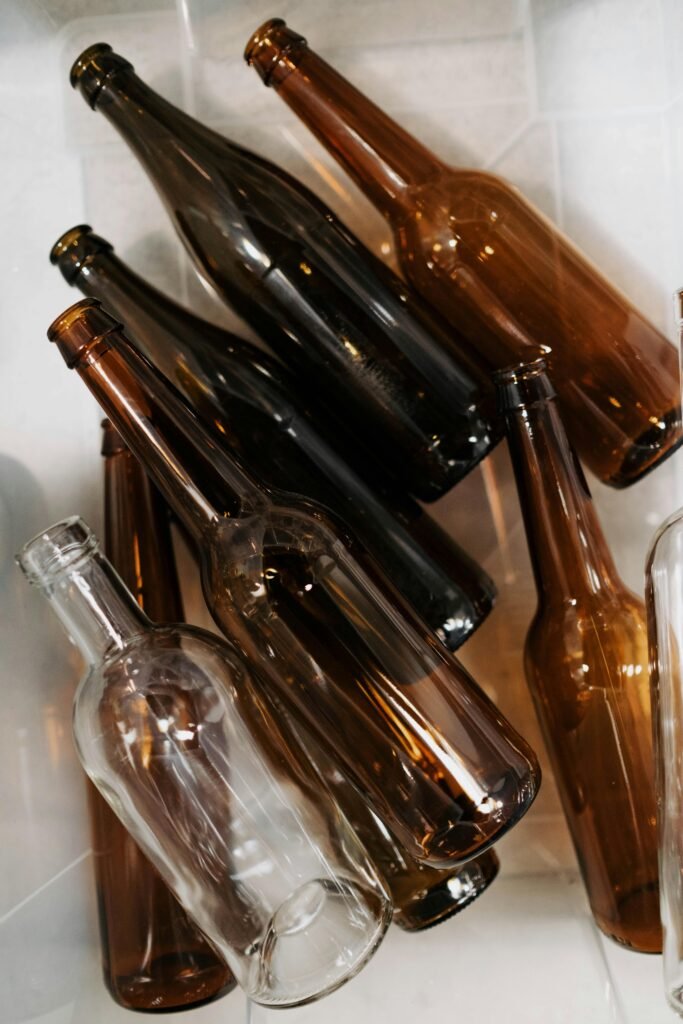 Empty glass bottles on a container